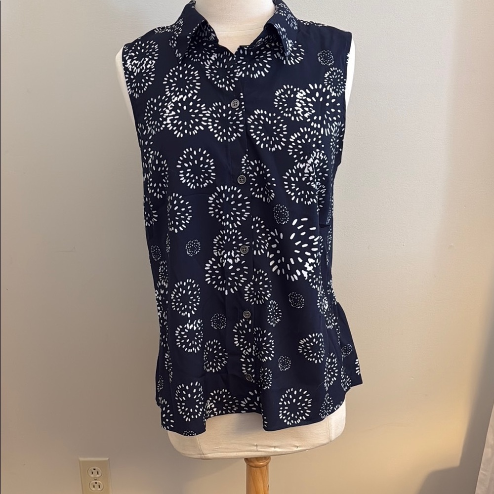 CAbi Navy Sleeveless Blouse with White Floral Design